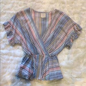 multicolored ruffled blouse